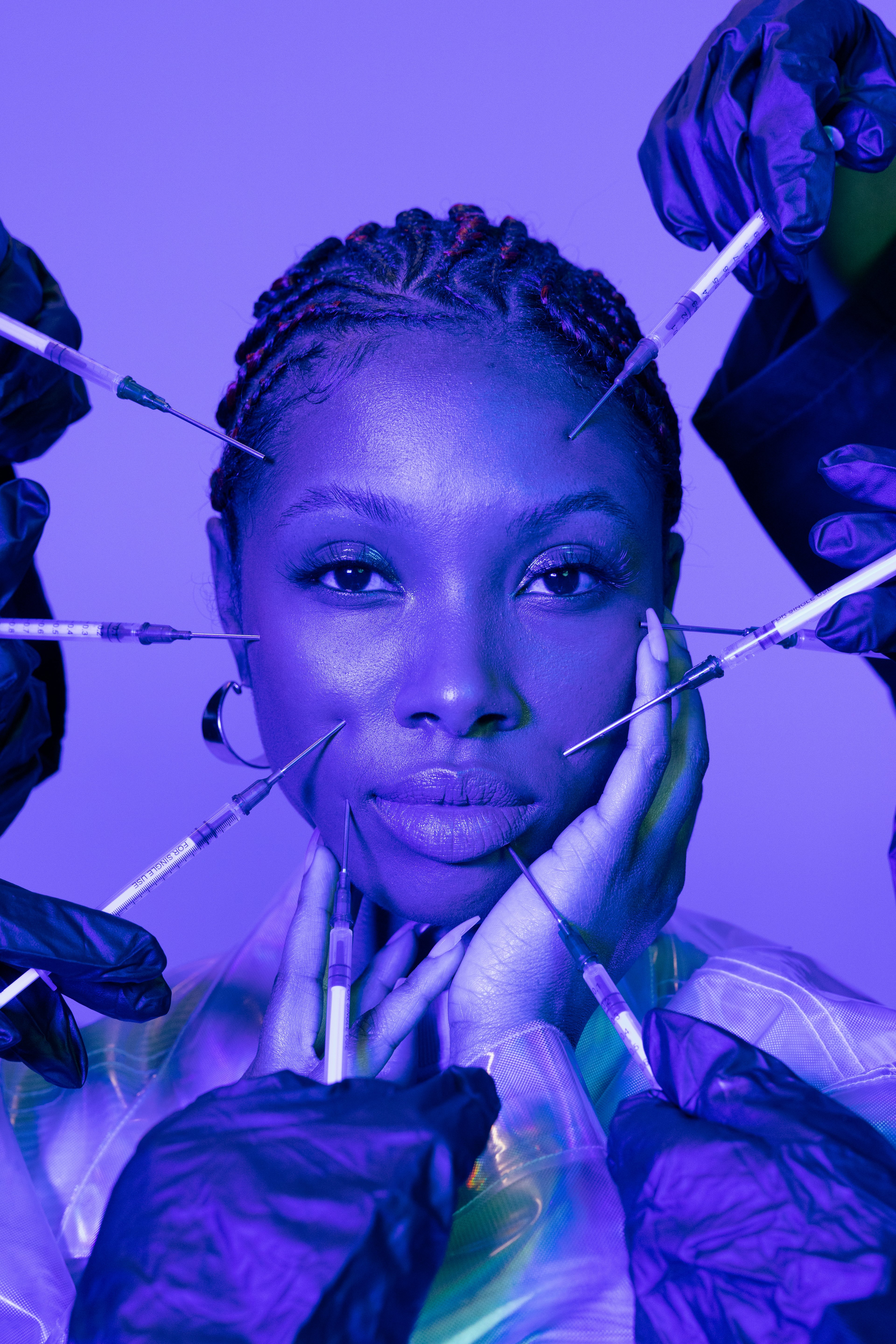 A woman with beautiful skin poses for the camera while awaiting treatment at a medical spa.